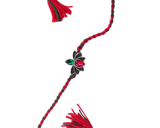 silver rakhi bracelet design emerald ruby lotus worn on wrist