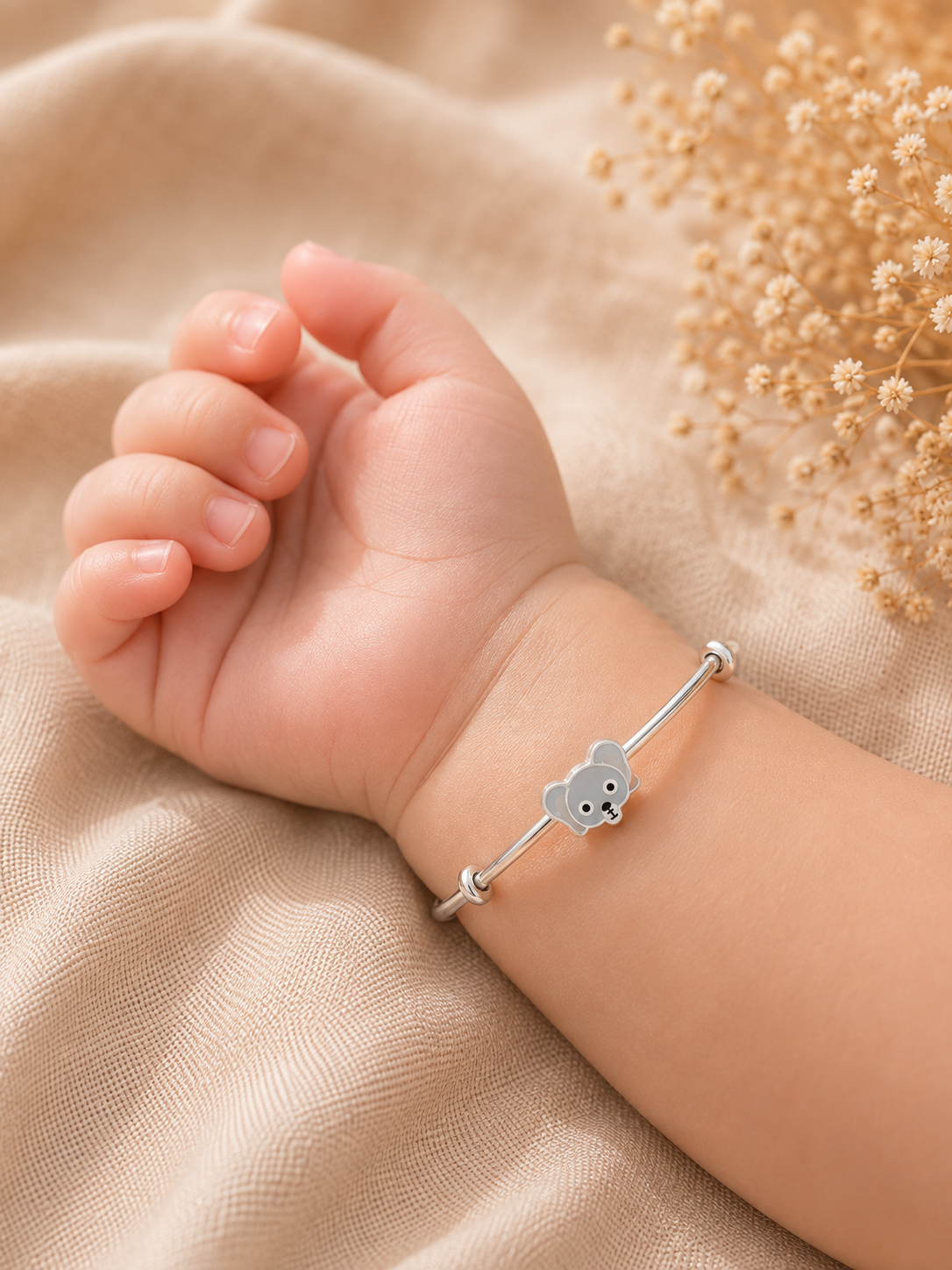 Adjustable silver bracelet on wrist for kids