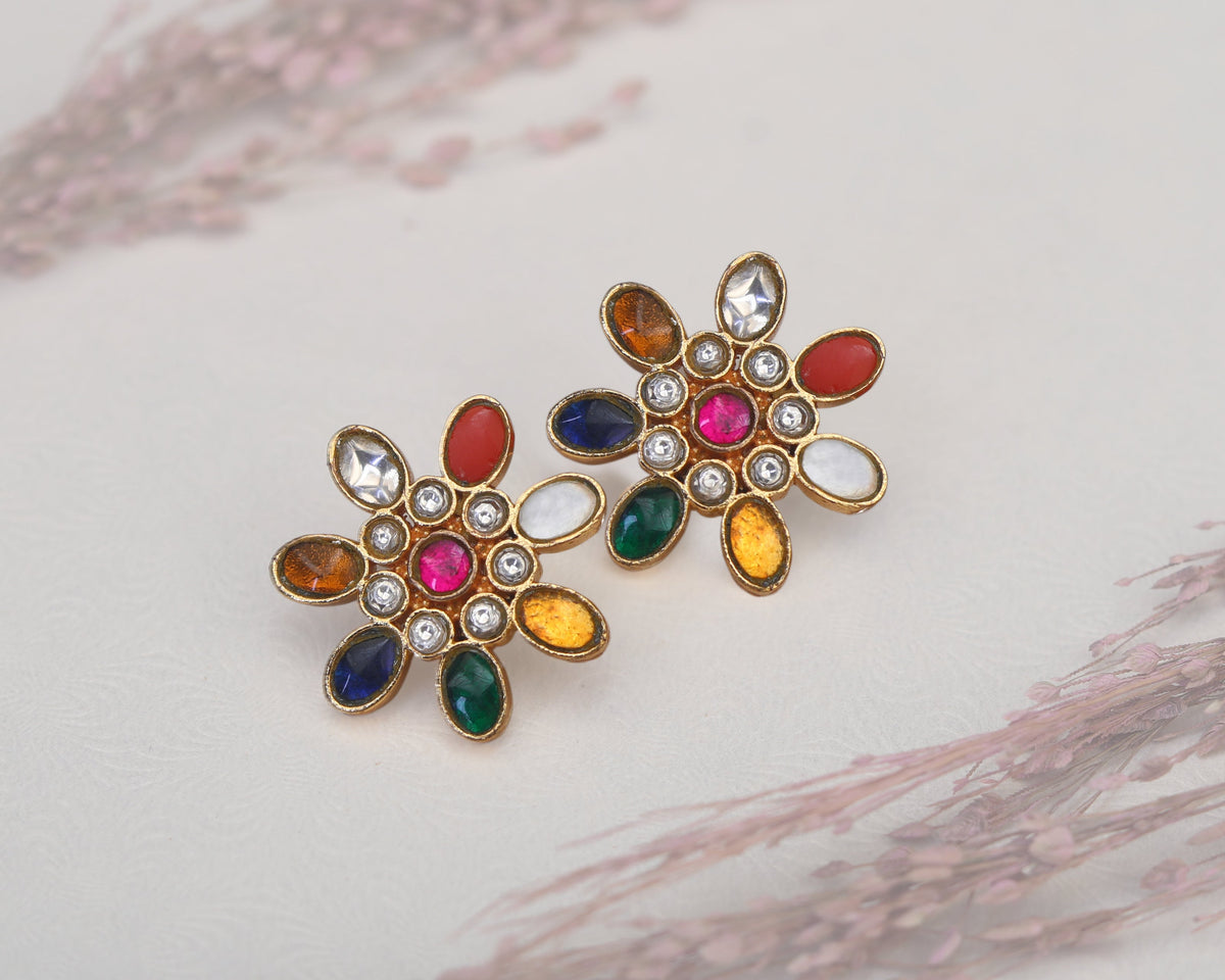 Close-up of rose floral stud earring design detail