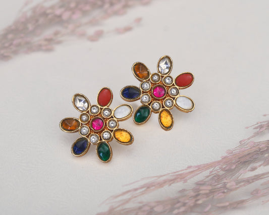 Close-up of rose floral stud earring design detail