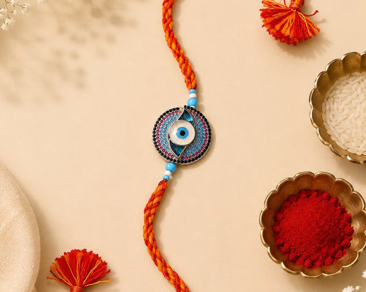 silver rakhi bracelet design evil eye stone studded worn on wrist