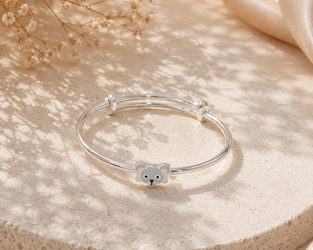 Silver elephant charm bracelet close-up