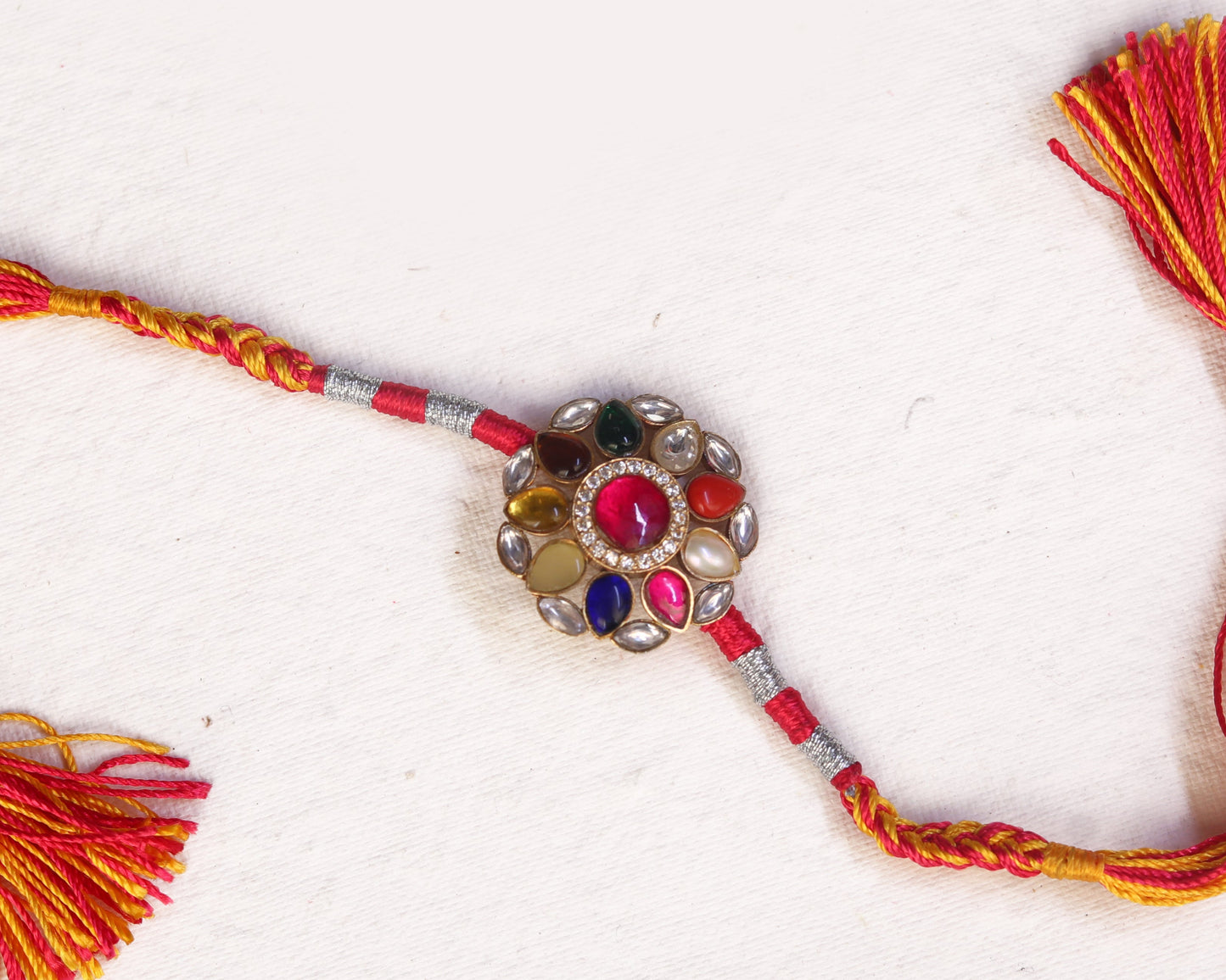 chandi rakhi bracelet Navrang royal multicolour stone detail