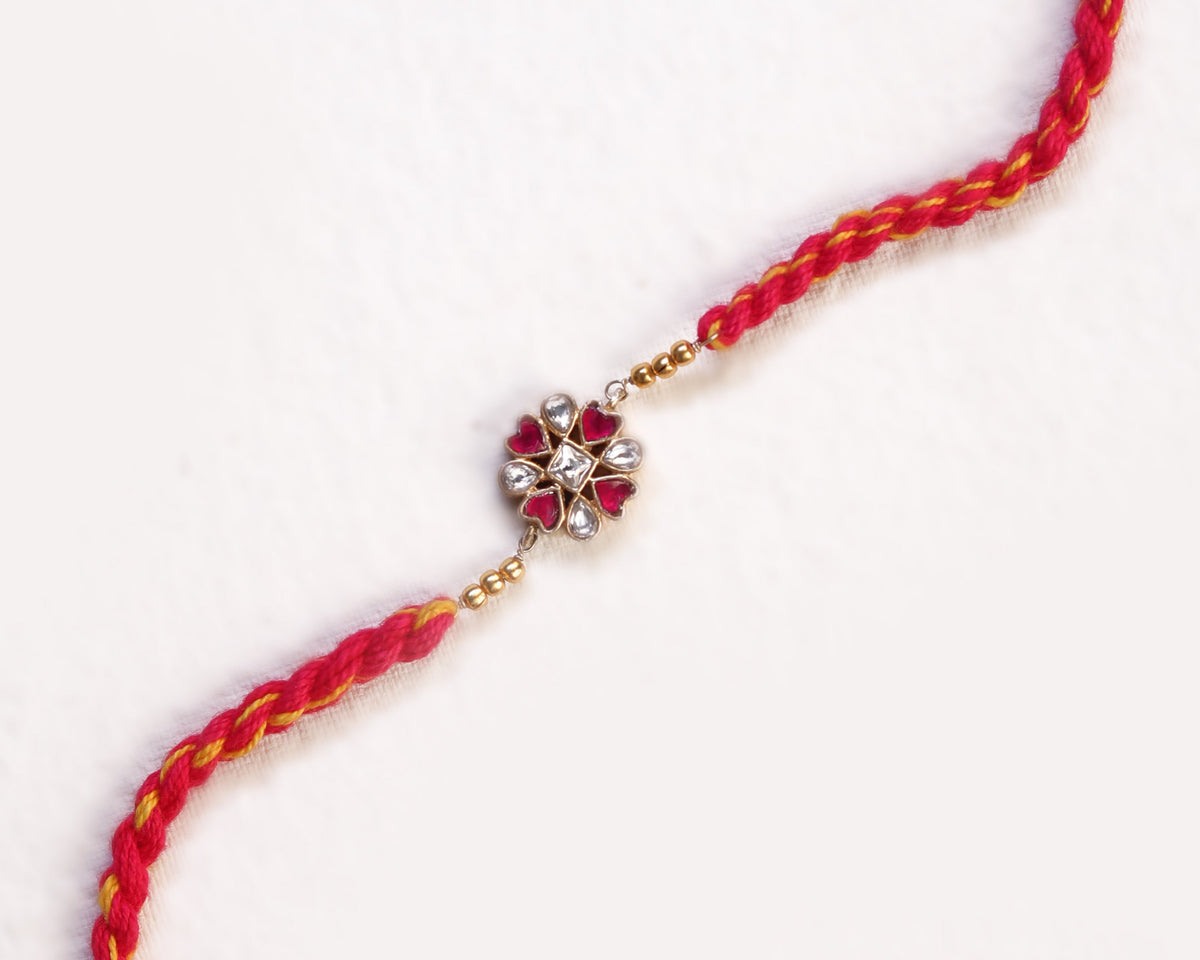chandi rakhi bracelet emerald ruby lotus stone detail
